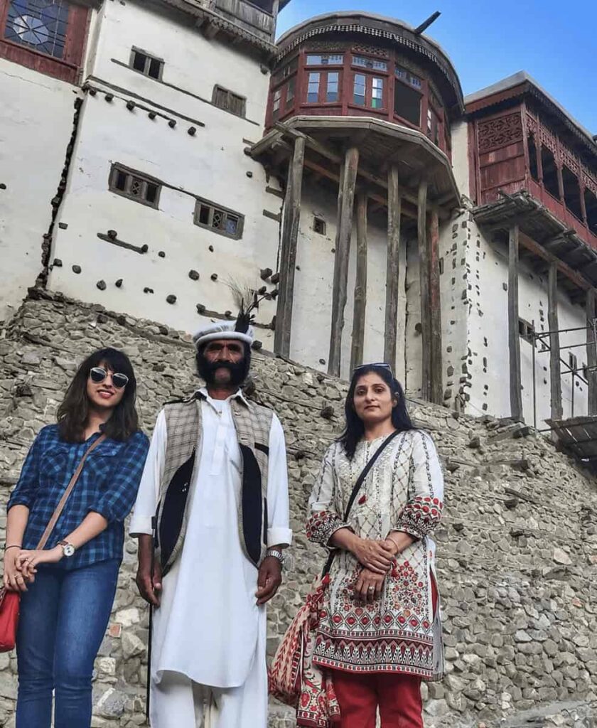 People standing in front of Baltit fort