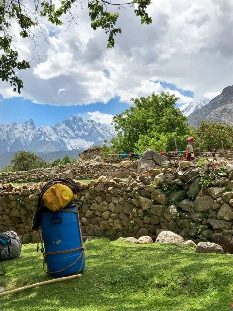 A drum of food supplies, by a campsite in the mountains