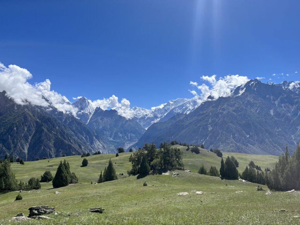 Meadows with mountains in the background in Pakistan