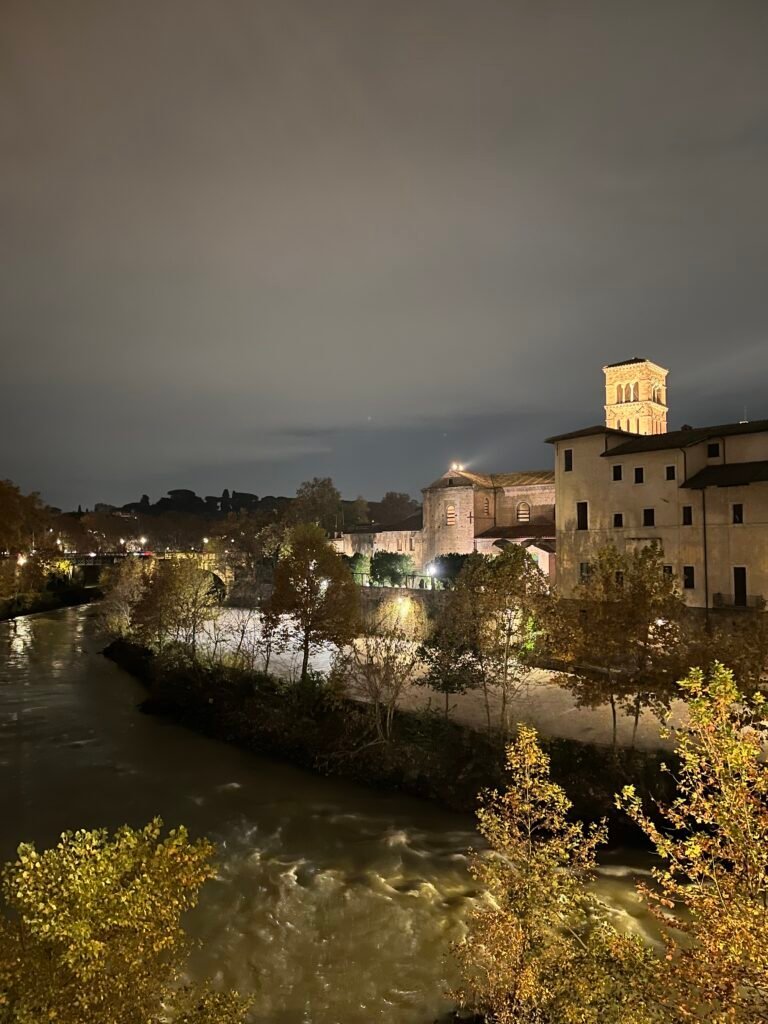 Tiber Island and the bell tower of San Bartolomeo all'Isola at night, on the walk between the centre and Trastevere.