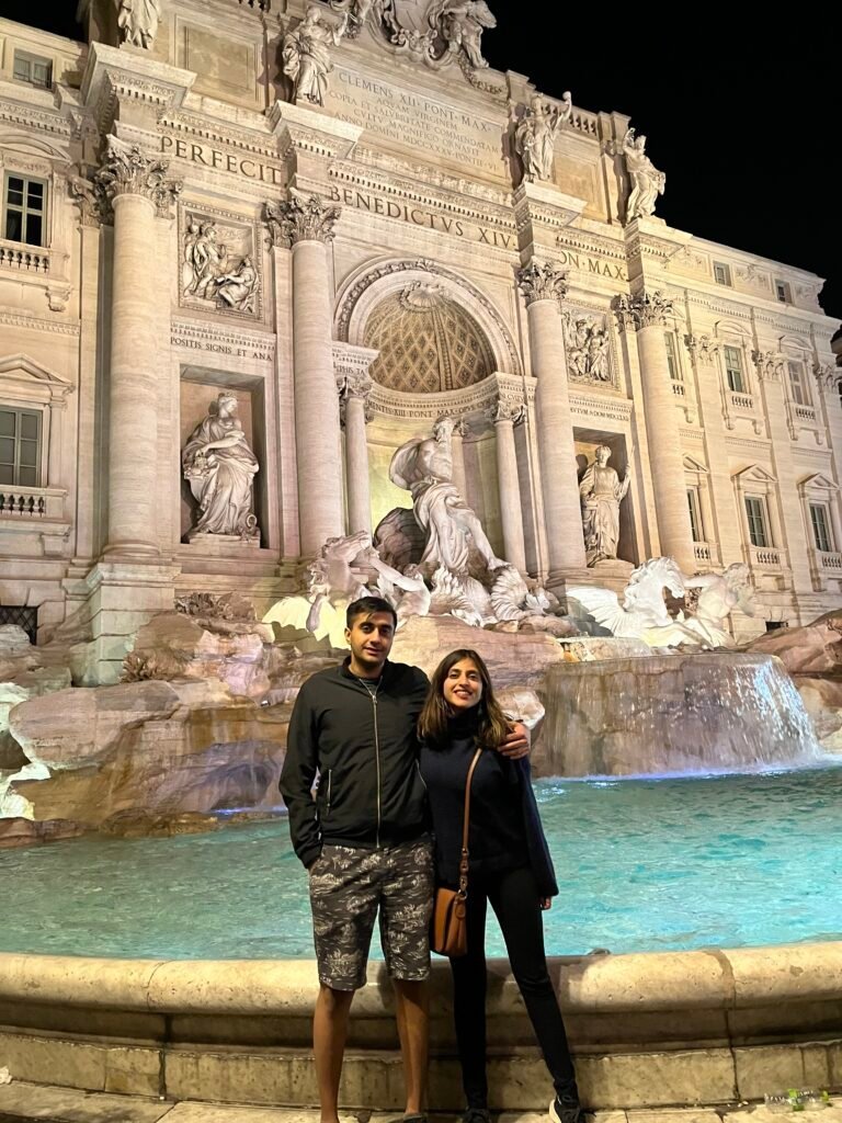 The two of us at the Trevi Fountain at night, an easy walk from Piazza Navona.